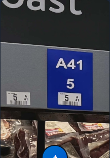 4x6 aisle location sign installed on a cooler